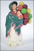 An early 20th century Royal Doulton figure 