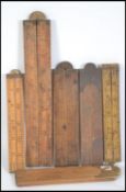 A collection of six vintage 20th century boxwood folding draughtsman's / carpenters rules to