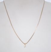 A 9ct gold diamond pendant and necklace chain.