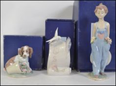 Two boxed Lladro collector society porcelain figures to include 