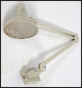 A 1950's wall mounted Industrial 1001 anglepoise lamp in white with original switch box attached.