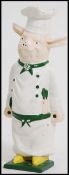 An original mid 20th century cast iron Butchers advertising / door stop pig retaining original