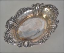 A silver hallmarked fret pierced rococo pin dish having Sheffield assay marks,
