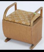 A vintage 20th century Art Deco styled Lloyd Loom laundry basket.