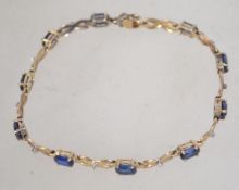 A ladies vintage 9ct gold and sapphire bracelet. The chain approx 18cms / weight 6.