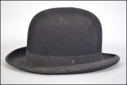 A Victorian gentlemans bowler hat marked to the inside for Tress & Co of London.