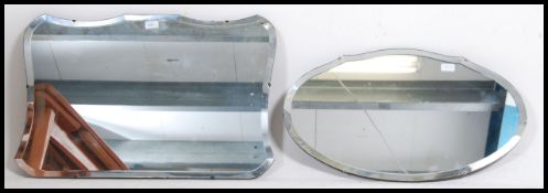 A large 1930's Art Deco frameless bevelled edge wall mirror together with a small frameless