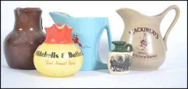 A collection of vintage 20th century advertising Breweriana water jugs with examples for