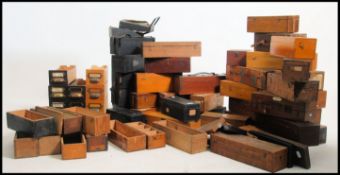 A vast collection of early 20th century Industrial glass magic lantern slide boxes and drawers