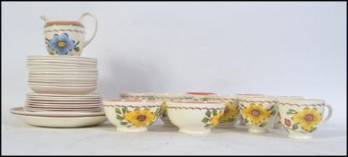 A early 20th century 1940's Bristol pottery part tea service.