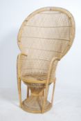 A vintage late 1970's retro wicker peacock armchair -chair. Large open back chair with woven seat.