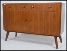 A mid 20th century retro teak sideboard in the manner of Vanson.
