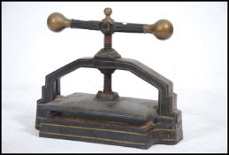 A 19th century very heavy Victorian book / deed press in cast iron with gun metal terminals.