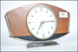 A good 1960's mahogany, marble and silver plate Metamic retro mantel clock.