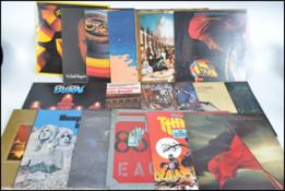 A good collection of vinyl long play LP records to include Genesis, Phil Collins, ELO x 3,