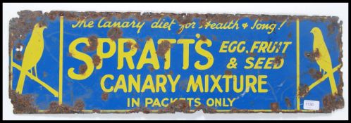 A vintage early 20th century single sided enamel advertising sign for Spratt's Canary food.