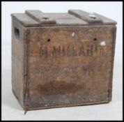 A mid century Industrial wooden hinged top crate of soda syphons. Each syphon with mesh panel work.