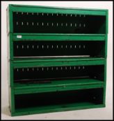 A vintage retro 20th century industrial metal sectional parts bin.