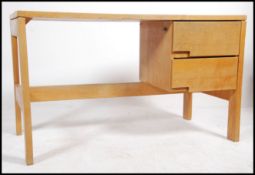 A 20th century retro desk on beechwood construction having open kneehole recess with drawers having
