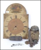 A 19th century painted face 30 hour longcase clock movement with chains and weight.