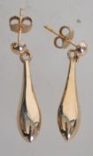 A pair of 9ct gold drop earrings. Weight 1g.