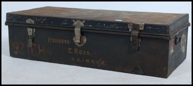 A vintage early 20th century croquet set complete with cast iron hoops,