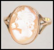 A 9ct gold cameo ring. Size P.5. Weight 3.1g.