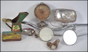 A collection of motoring related wares to include a cow horn motorcycle handlebar, Oil can,