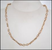 A hallmarked 9ct gold twist chain link necklace with fob clasp. Weight 36.5g. Measures 16 inches.