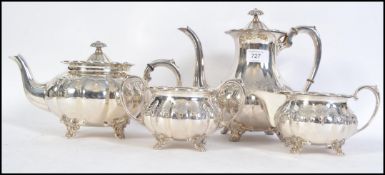 A 20th century four piece silver plated tea service by Cooper Brothers consisting of teapot,
