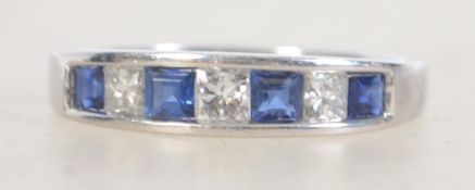 14ct white gold diamond & sapphire ladies ring being channel set. Total weight 3.