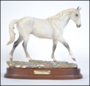 A Royal Doulton model of Dessert Orchid, DA134, modelled by Graham Tongue, limited edition No.