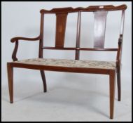 An Edwardian mahogany inlaid two seat sofa Settee.