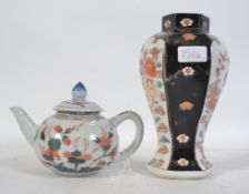 A Chinese Imari teapot complete with the lid having foliate decoration together with a hexagonal