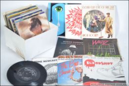 A group of 45rpm records to include Big Den Hegarty and the random band, Bloodshot, The Mircales,