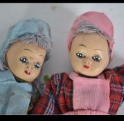 Doll family with hand painted bisque faces , fully clothed. Measures: 19cms high.