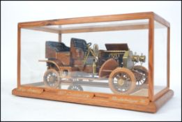 An impressive hand carved and crafted cased wooden model of the 1907 American Locomobile Model Type