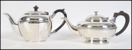 Two early 20th century Art Deco silver plated teapots both with bakelite handles and marked to the