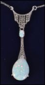 A substantial silver and opal art deco style pendant necklace and chain.