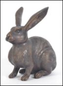 A good sized 20th century bronzed rabbit / hare.