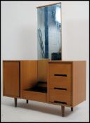A 1960's Stag C Range dressing table - chest of drawers by John and Sylvia Reid.