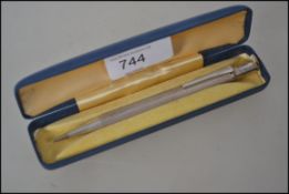 A hallmarked Yard O Lead sterling silver engine turned propelling pencil in it's original