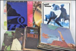 A collection of long play vinyl records dating from the 1970's to include Roxy Music,