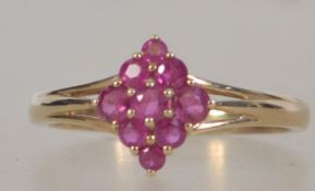 9ct gold hallmarked ruby cluster ring. Weight 2.7g. Size S.5.
