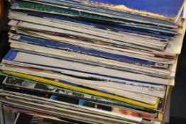 A collection of vinly long play LP's and 12