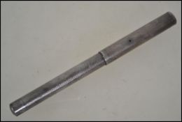 A Sterling Silver engine turned ladies lever fountain pen.