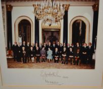 A framed and glazed photograph of Queen Elizabeth and the Privy Council dated 1981.
