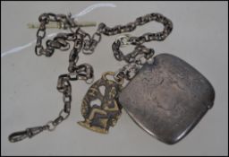 A silver hallmarked vesta decorated with floral design.