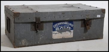 A substantial vintage early 20th century metal steamer trunk.