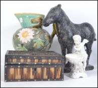 A large terracotta Chinese style horse together with a Majolica style ewer ( A/F ) and a cherub